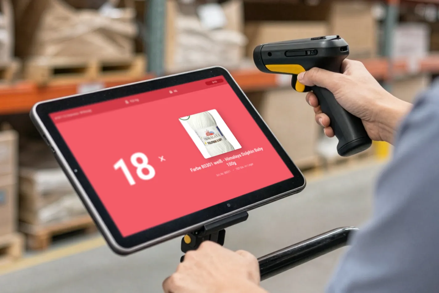 Warehouse worker holding tablet with digital picking list, scanning yarn product with handheld barcode scanner, organized warehouse with product shelves in background, professional setting, 16:11 aspect ratio, photorealistic